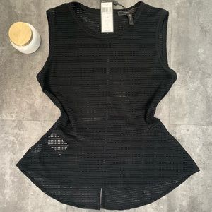 BCBG Black peplum top with silver zipper back.